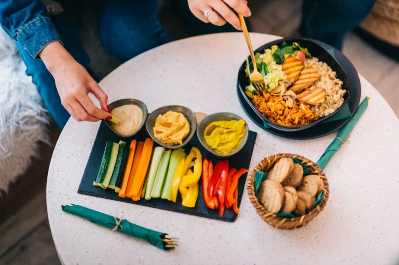Veggie hummus wrap with roasted peppers and spinach