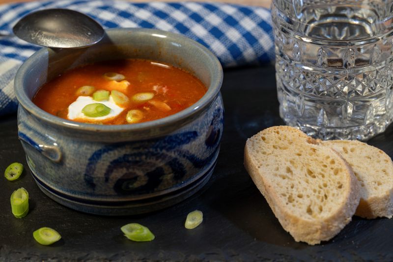 Tomato bisque soup with basil and fresh cream