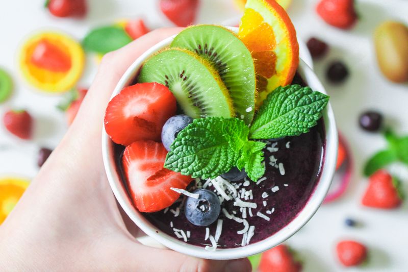 Seasonal fruit cup with fresh berries and mint