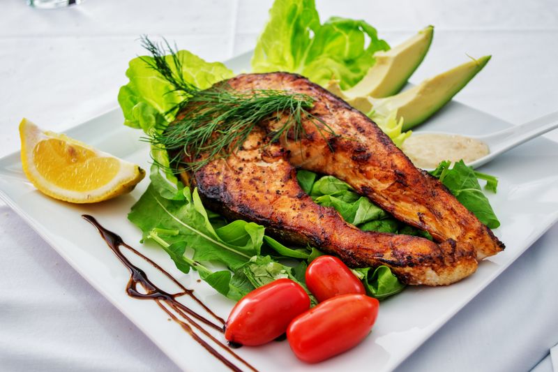 Extra protein add-on with grilled salmon and lemon